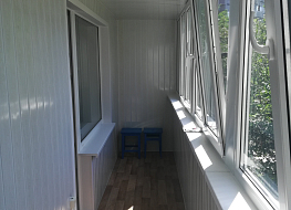 Установка рамы и балконного блока, обшивка балкона.